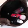 Compartiment intérieur spacieux de la trousse de toilette homme avec doublure